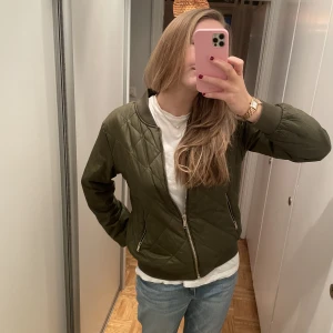 Mos mosh jacka - Mos mosh quiltad jacka som inte används 