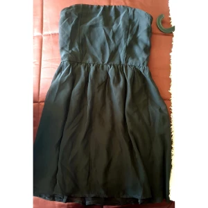 Klänning - Peplumliknande klänning 