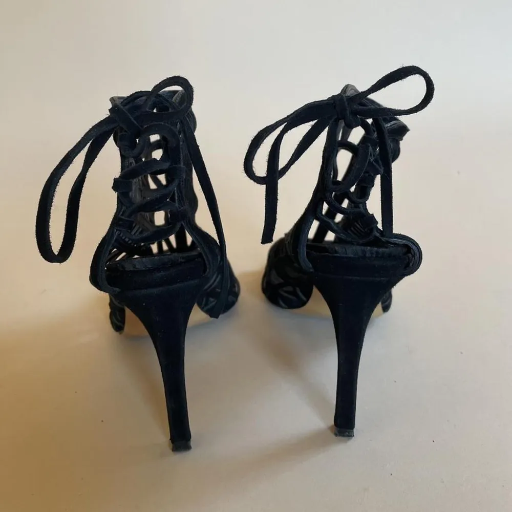 Black Caged Heels Wears Comfortably with Adjustable Heel Lace Up  Black Suede Leather in Geometric Cage Design Gently Worn, One Lace is Shortened but can still be tied beautifully without notice EU Size 38  #black #cage #strappy #sandals #heels. Skor.