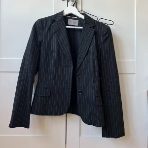 Kavaj  - Använd väl men mycket bra omhändertagen 