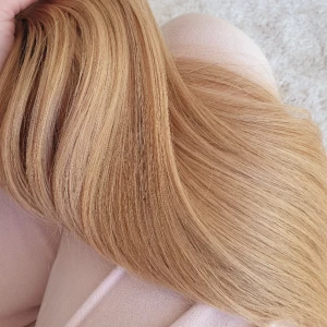 Löshår märkblont varm - Löshår i träns 50 cm i en vsrn mörkblond färg i fin kvalite, tränset är i 3 delar 