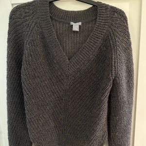 Stickad tröja  - Glittrig oversize tröja