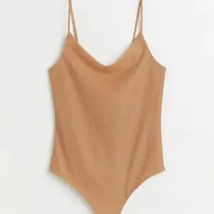 Guldglittrande string bodysuit från Hm. Helt oanvänd prislappen kvar.