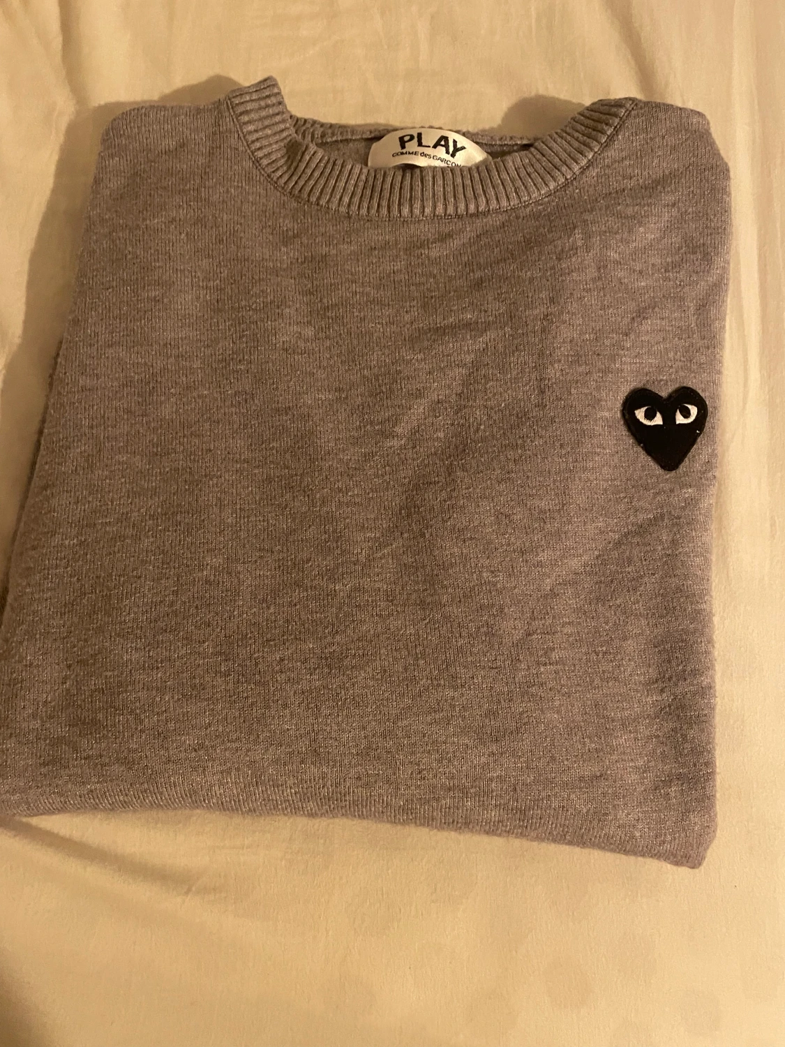CDG stickad tröja