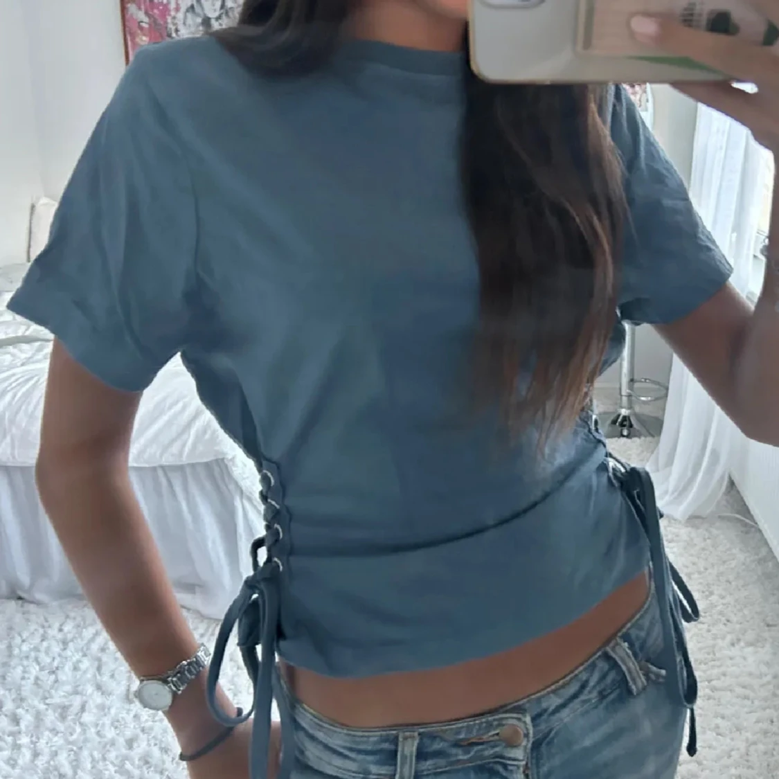 Blå croppad topp med snörning