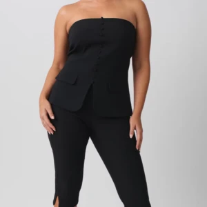 Svart tubtopp - Snygg svart tubtopp med knappar framtill. Perfekt för en stilren look. 