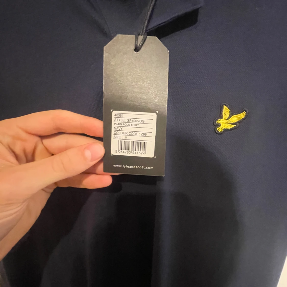 Mörkblå pikétröja från Lyle & Scott - 90