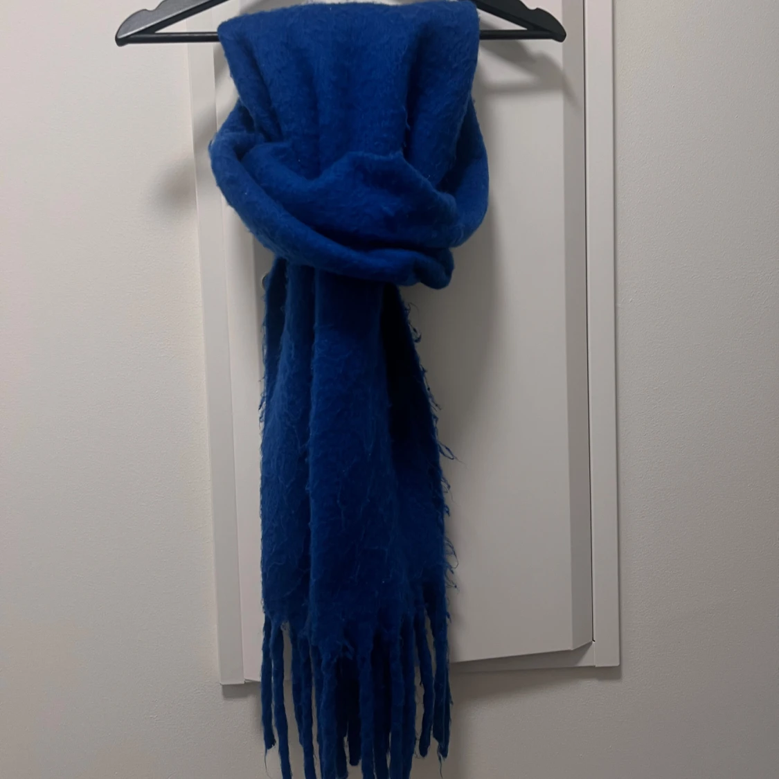 Blå halsduk med fransar