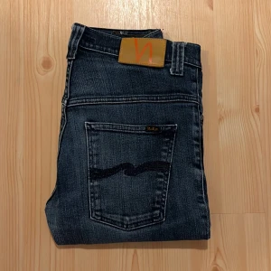 Nudie jeans - Ett par nudie jeans i en riktigt fet wash | skick 9/10 | nypris ca 1600 kr!