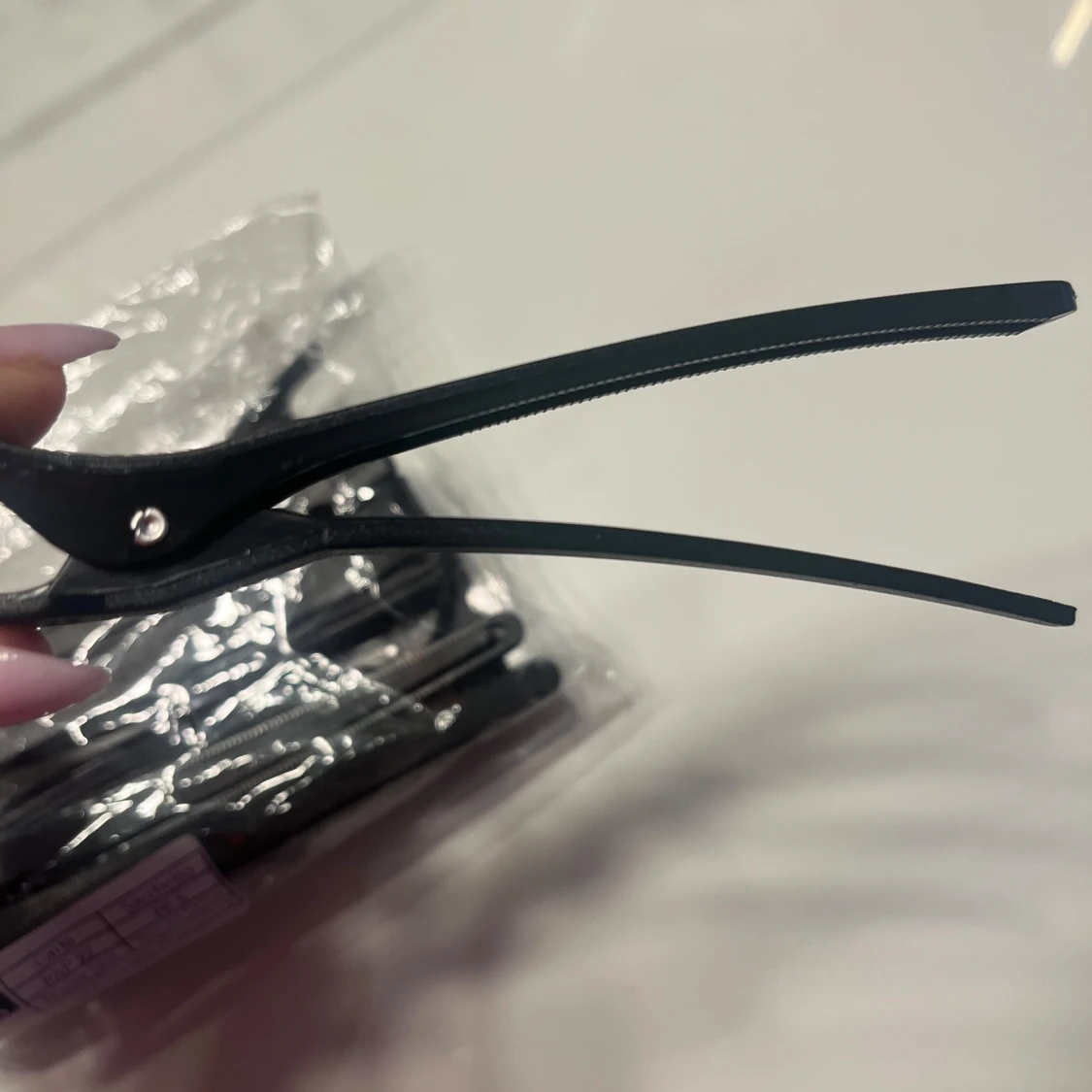 Svarta hårklämmor - 91