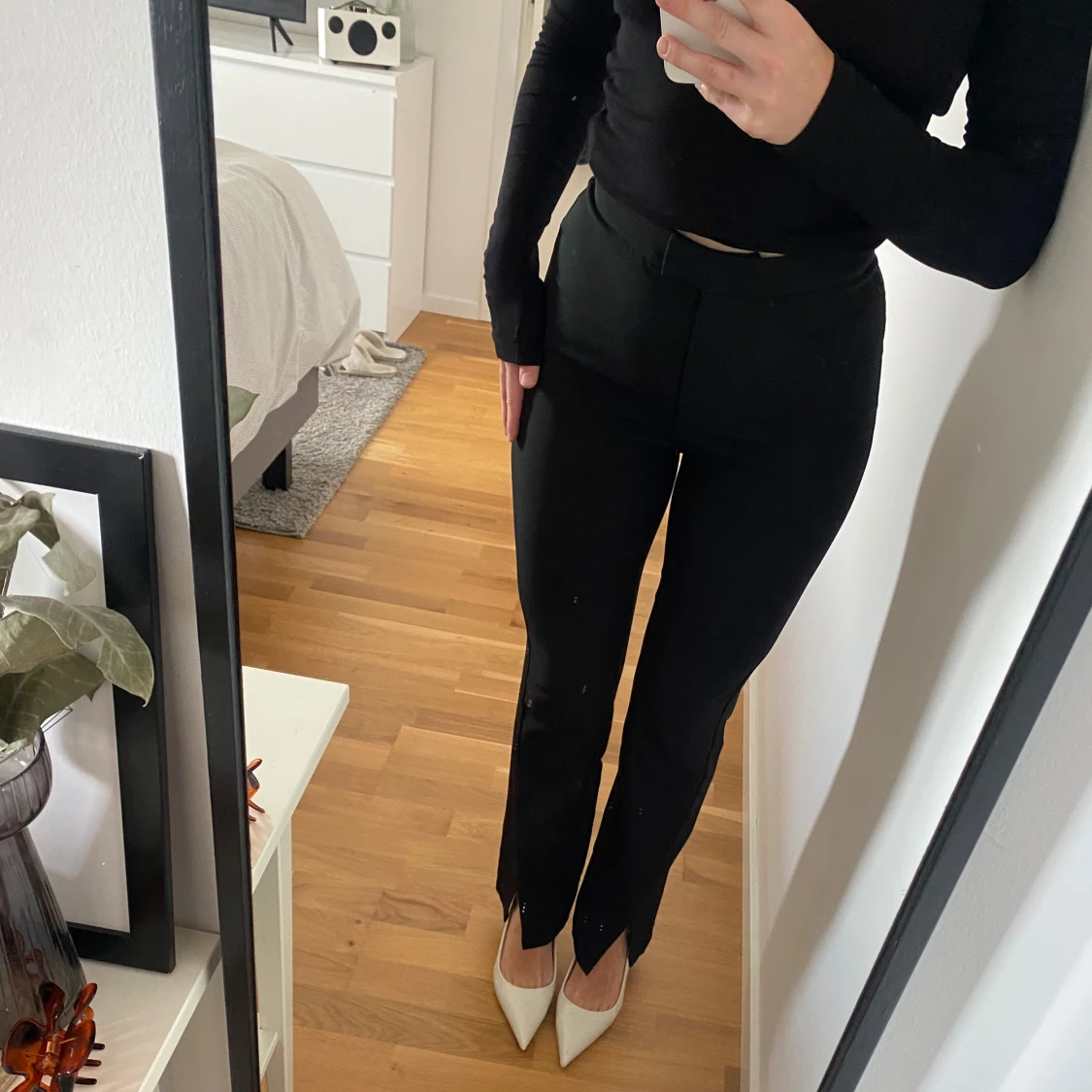 Svarta kostymbyxor
