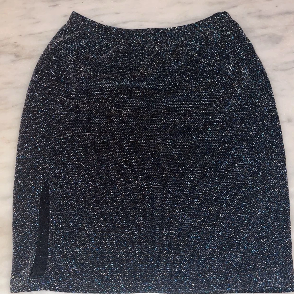 Glittrig kjol från Venderby's