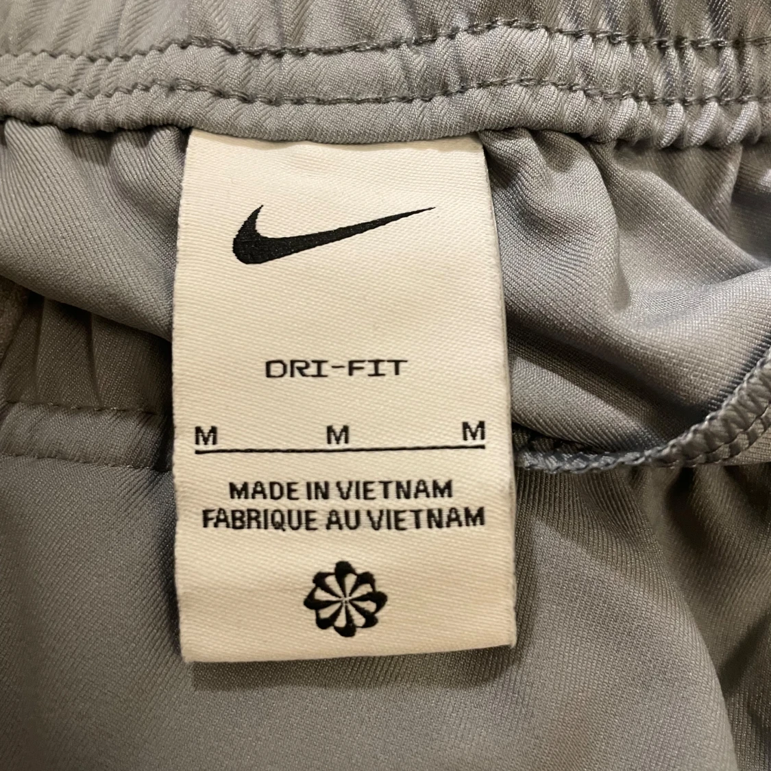 Gråa trackbyxor från Nike - 91