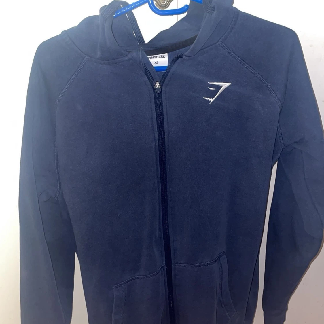 Mörkblå zip hoodie från Gymshark