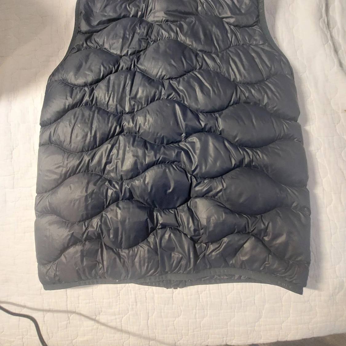Blå dunväst från Peak Performance - 90