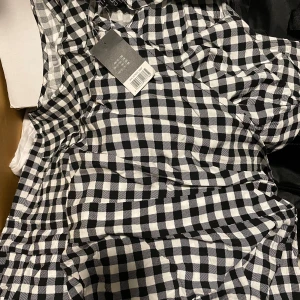 Klänning  - Oanvänd nykläning