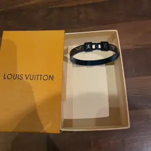 LV armband mörk blå ny 