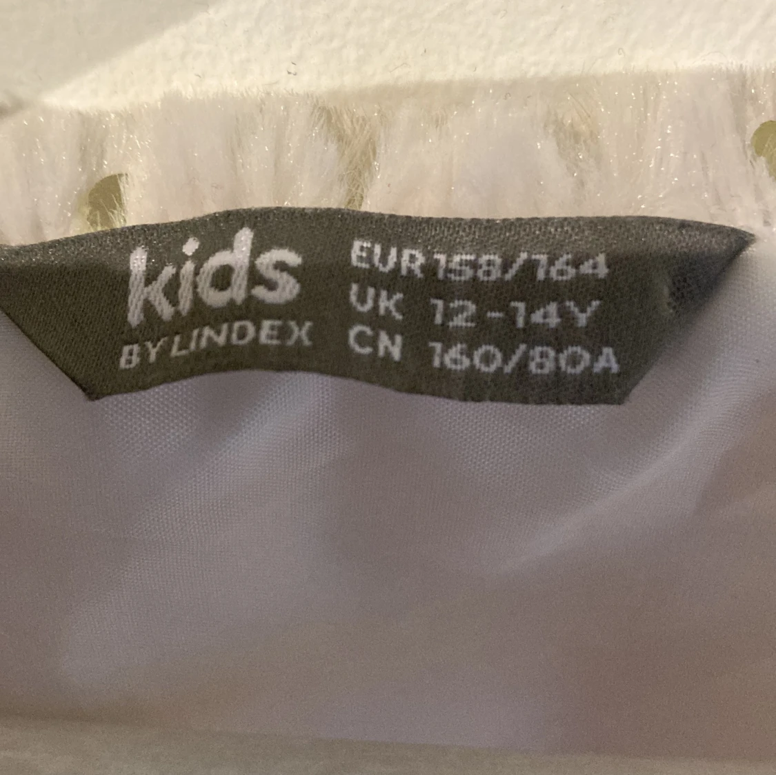 Vit paljettprydd bolerotopp från Lindex - 91