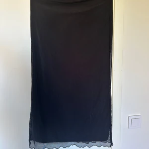 kjol - lång kjol, aldrig använt, storlek L