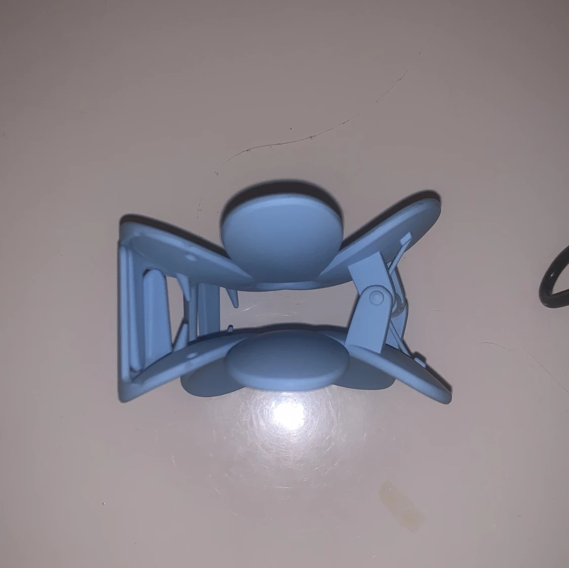 Blå blomformad hårklämma - 90