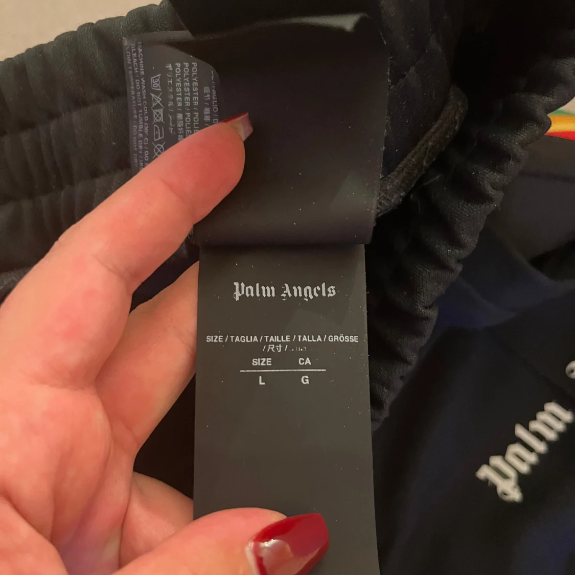 Svarta byxor med regnbågsränder från Palm Angels - 91