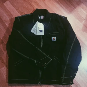 OG Detroit jacket Black rigid- carhartt - Oanvänd, storlek L, Svart