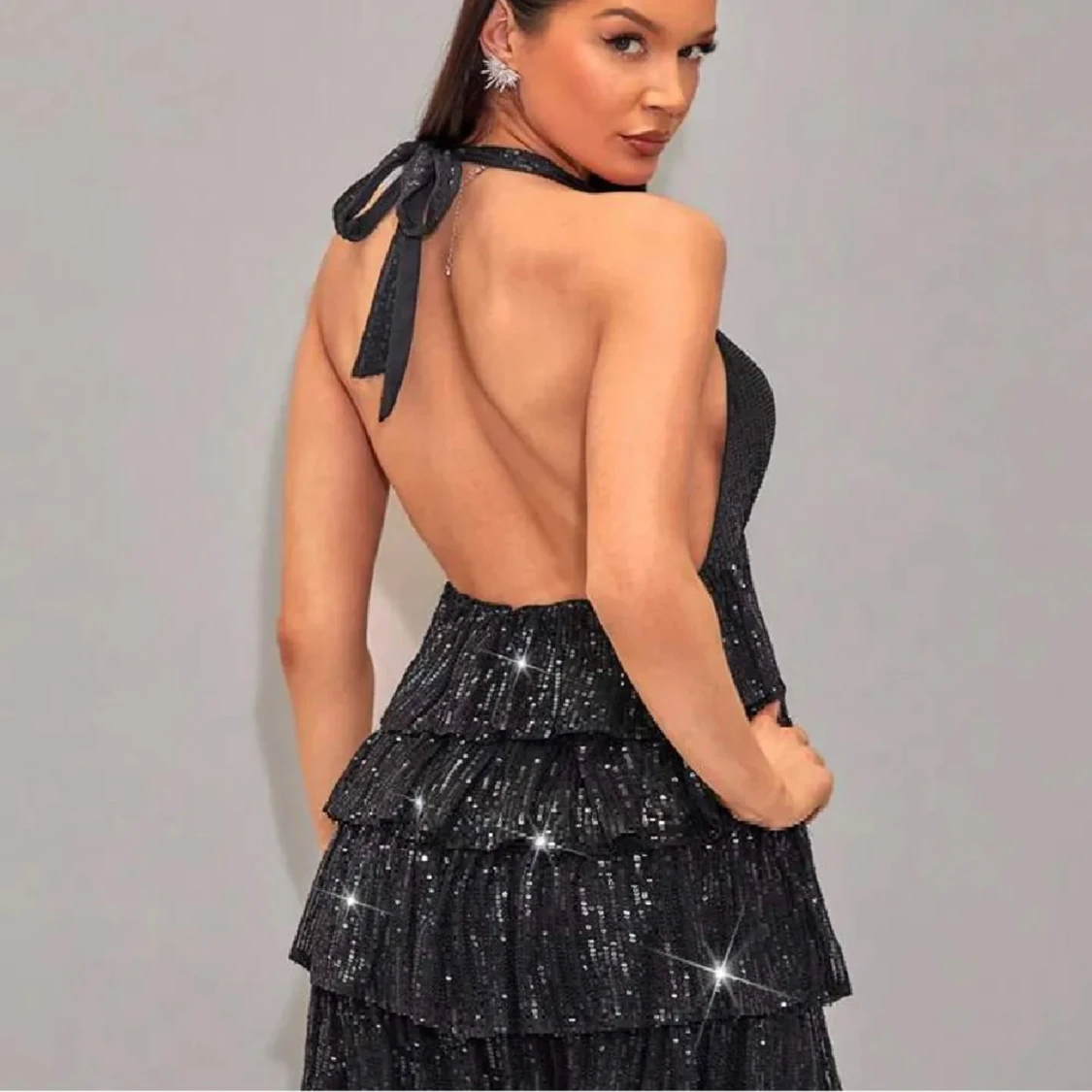 Svart glittrig klänning 