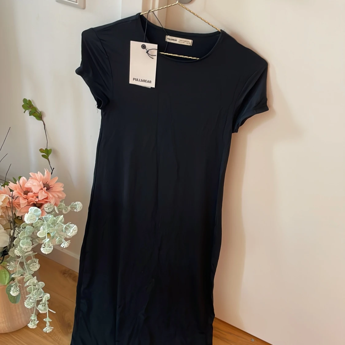 Svart Jerseyklänning figurnära - 91