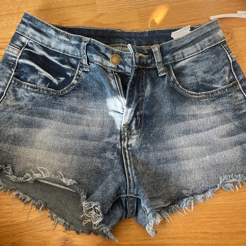  Jättefina Mönstrade fickor inte riktig jeans . Shorts.