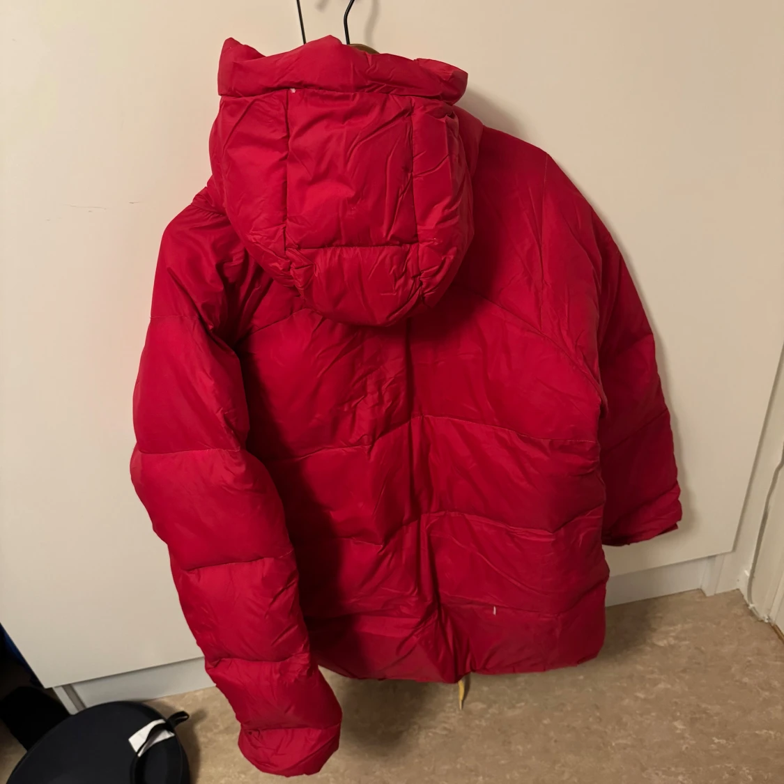 Röd dunjacka från Fjällräven - 90