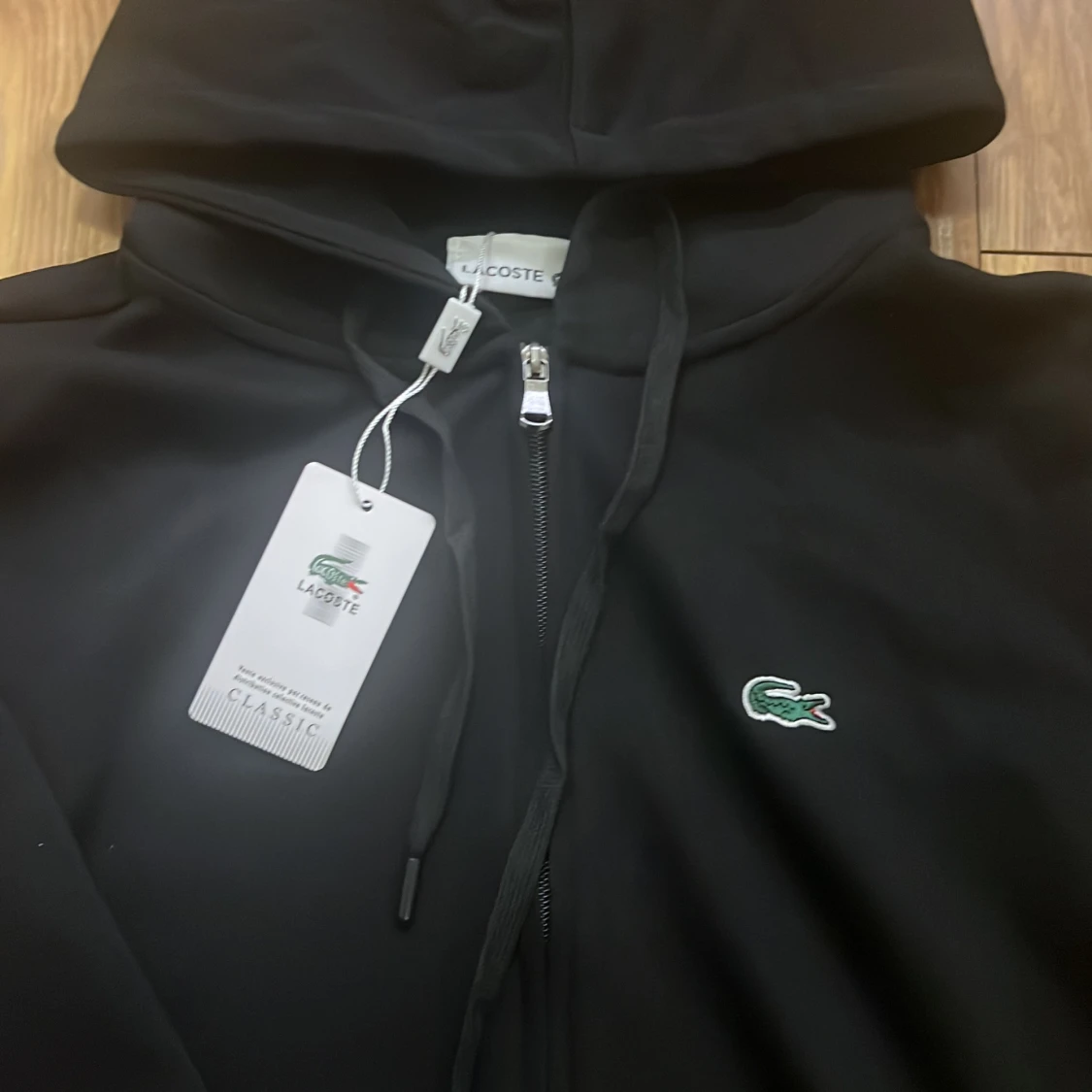 Svart hoodie från Lacoste - 90