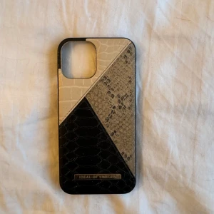 Mobilskal - Ideal of Sweden skal för iPhone 12. Knappt använd. 