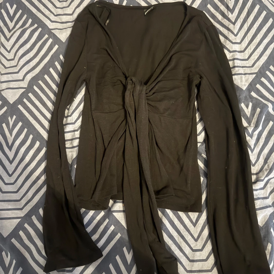 Svart långärmad topp från Gina Tricot