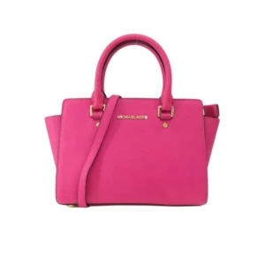 Michael kors väska  - En rosa Michael kors väska i nyskick, använd fåtal gånger.