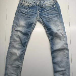 True Religion jeans stl 24 - Ljusa, blekta Truies, section skinny.