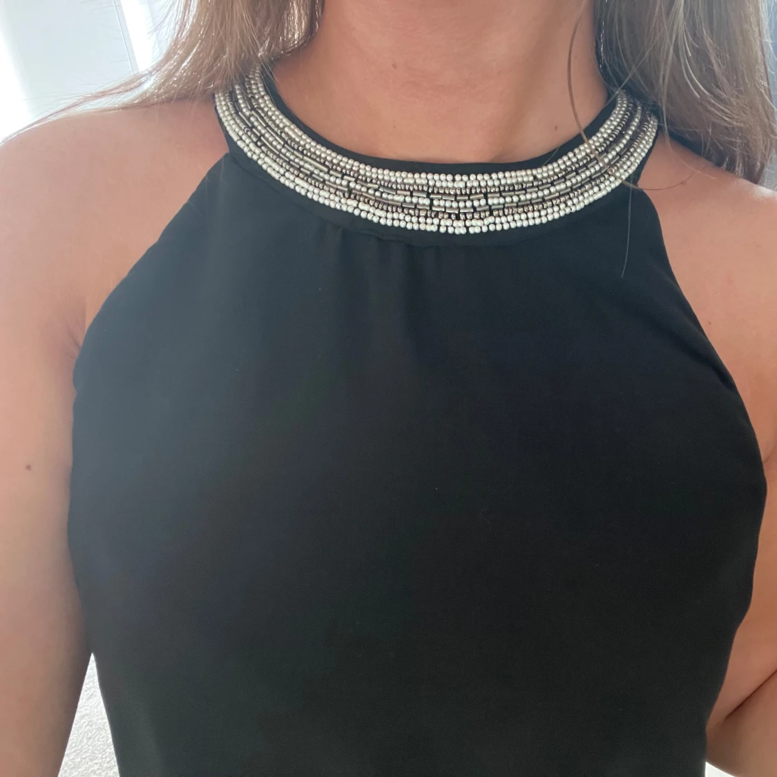 Svart halterblus - 91