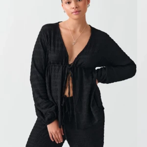 Structure top  - Aldrig använd, var tänkt att ha med till stranden som en tröja över bikini eller hemma tröja men köpte fel storlek! Dock väldigt bekväm 