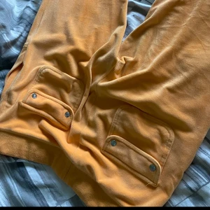 Gul/orange juicy byxor - Storlek S  