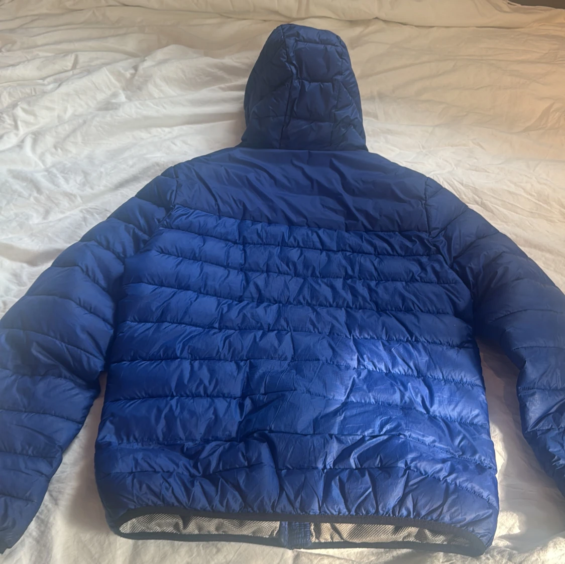 Blå dunjacka från Champion - 90