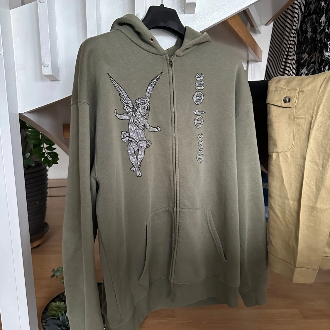 One of one zip hoodie