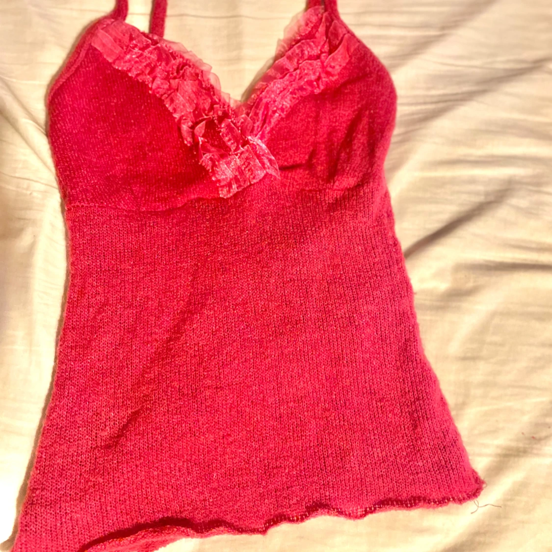 Rosa stickad linnetopp