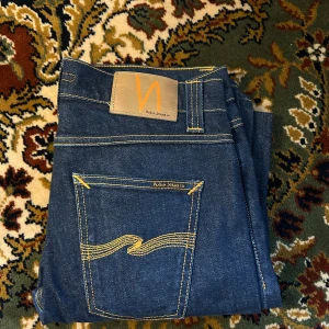  Nudie Jeans - Otroligt snygga nudie jeans i nyskick! Jeansen är i storlek 29/32 och har inge tecken på användning! Pris är ej hugget i sten👌🏾 Mvh 