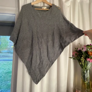 Poncho  - Poncho från Lindex 