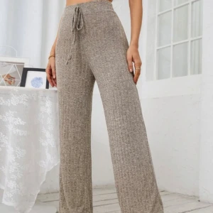 Bruna byxor - Mjukis material