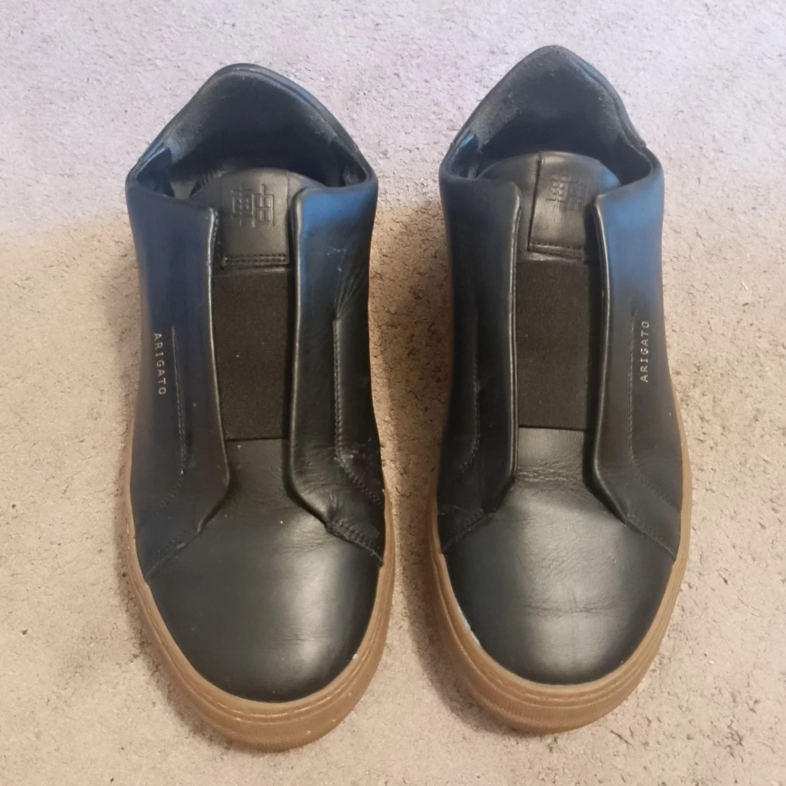 Svarta sneakers från Axel Arigato st 40