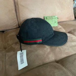 Gucci keps -  äktahetsbevis finns, garanterat äkta av vinted experter. Helt felfri