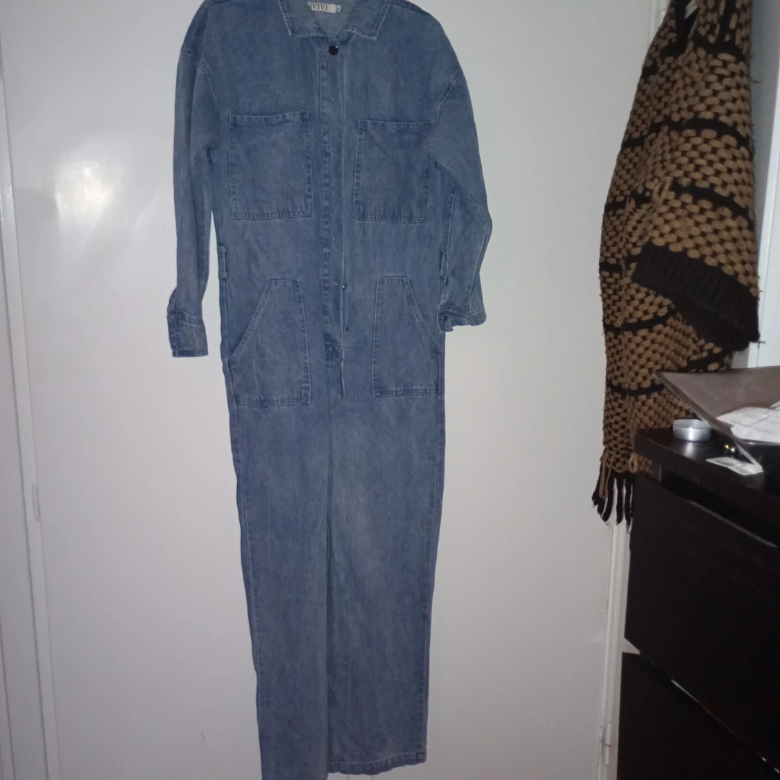 Blå jeans jumpsuit med fickor