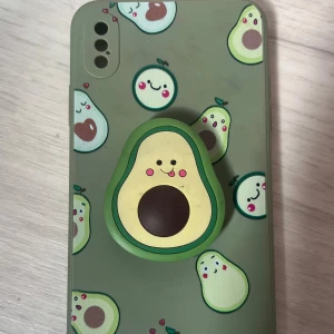 Avokado mobilskal - Avokado mobil skal med hållare! passar iphone xs max💗kontakta vid intresse! betalning via swish💗