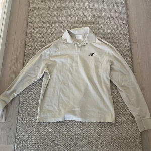 Långärmad arigato skjorta  - Långärmad arigato skjorta i storlek L