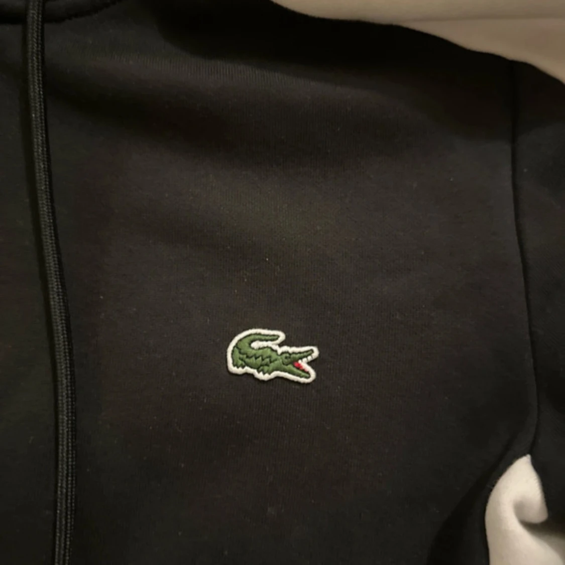 Svart hoodie från Lacoste - 1